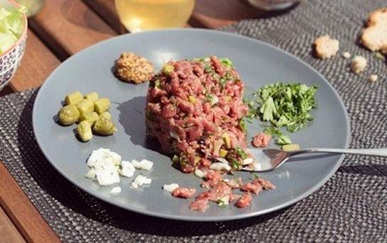 Freshly cut beef Tartare with home-made sauce.